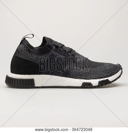 Vienna, Austria - May 27, 2018: Adidas Nmd Racer Pk Knit Black, Grey And White Sneaker On White Back