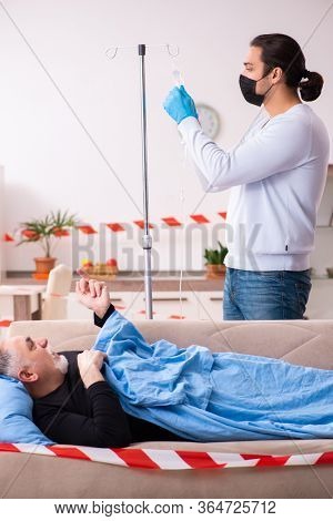Father and son in coronavirus disease concept at home