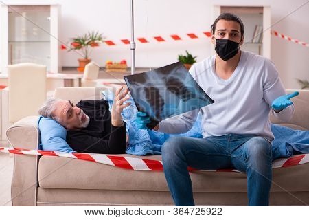 Father and son in coronavirus disease concept at home