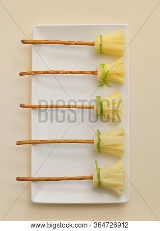 Snack Cheese And Salt Sticks Broomsticks On Plate