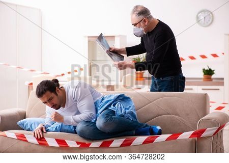 Father and son in coronavirus disease concept at home