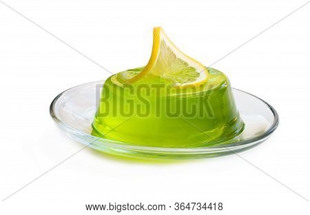 Green  Jelly On Glass Saucer Isolated On White