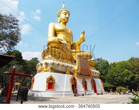 Uthai Thani, Thailand - January 04, 2020 : Big Golden Buddha Name Luang Pho Tho At Wat Pha Tang Temp
