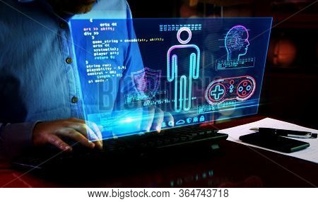 Create And Code New Game. Hud Display And Man Typing Keyboard. Futuristic Concept Of Cyber Video Gam