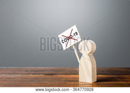 A Person With A Poster Protests Against Quarantine Measures. Conspiracy Theories Followers. Denial O
