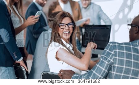 company employees discussing financial dat