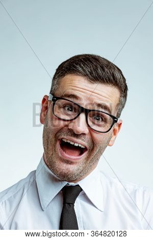 Funny Portrait Of Laughing Businessman