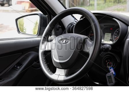 Novosibirsk/ Russia - May 02 2020: Lada Granta, Auto Interior: Steering Wheel With Red Logo  Mitsubi
