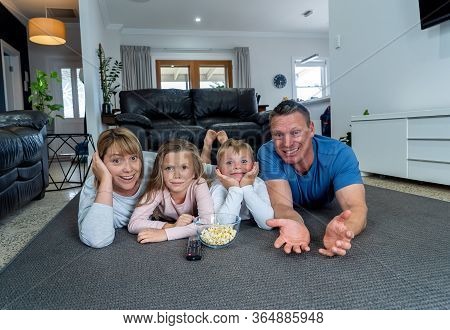 Covid-19 Stay At Home, Save Lives. Family In Staying Home Happy To Stop The Coronavirus Spreading.