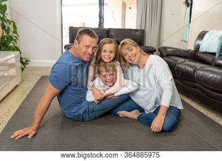 Covid-19 Stay At Home, Save Lives. Family In Staying Home Happy To Stop The Coronavirus Spreading.