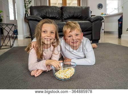 Covid-19 Pandemic - Lockdown. Stay At Home, Save Lives. Happy Caucasian Boy And Girl Together In Iso