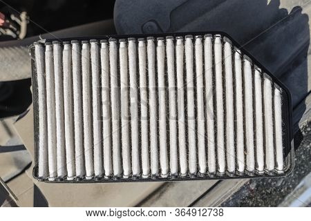 Dirty Old Passenger Car Engine Air Filter - Top View