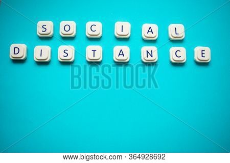 Social Distance Message With Game Letter Blocks, With The Letters Very Separated, Illustrating This 