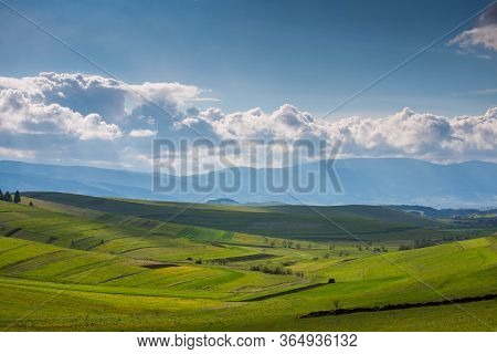 Beautiful Green Valley At Springtime, Gathering Stormclouds , Agricultural Fields In Transylvania, R