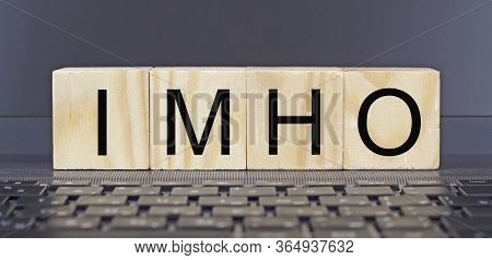 Imho Word Concept On Cubes On Keyboard.