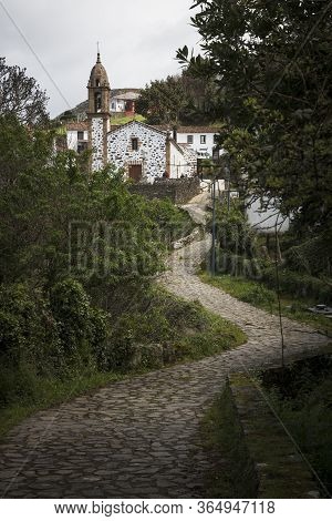 San Andres De Teixido, Spain - 01, 04, 2017: A Winding, Cobbled Path Leads To The Chapel Of San Andr