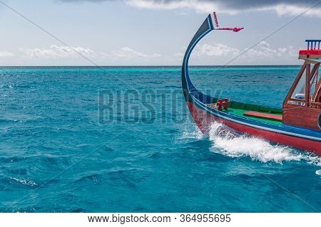 Wonderful Maldivian Boat Dhoni On Tropical Blue Sea, Taking Tourist To Snorkeling And Diving To See 