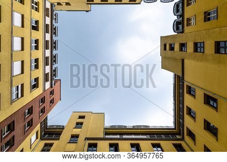 Berlin, Germany - July 29, 2019: Courtyard Of The Colorful Residential Buildings In Quartier Schutze