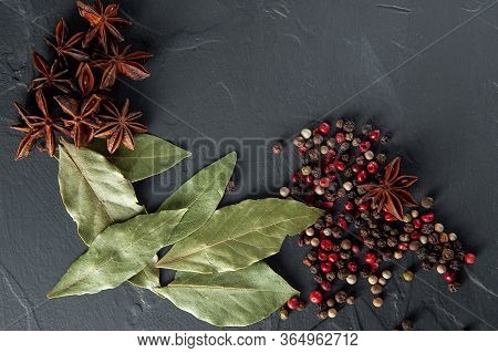 Spices Bay Leaf Badyan And Pepper On A Dark Background