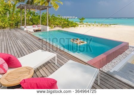 Breakfast In Swimming Pool, Floating Breakfast In Luxurious Tropical Resort. Table Relaxing On Calm 