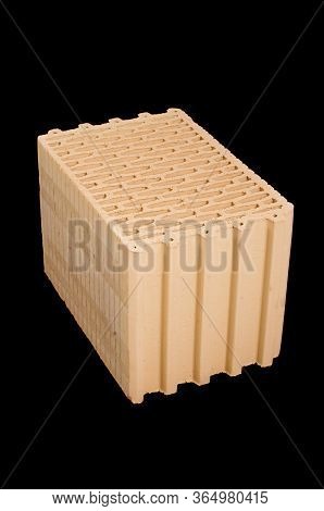 Ceramic Building Block Isolated On The Black Background