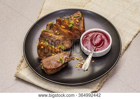 Roast And Braised Duck Breast With Sweet And Sour Berry Sauce