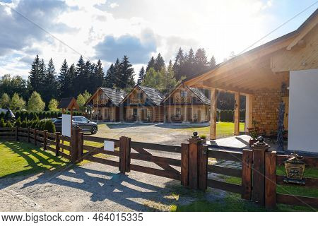 Wooden Elological House In The Village, Sunny Summer Day