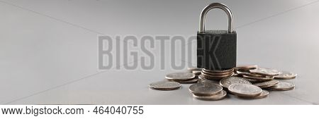 Close-up Of Padlock Stand On Stack Of Coin, Financial Security, Symbol For Protection Finance. Keep 