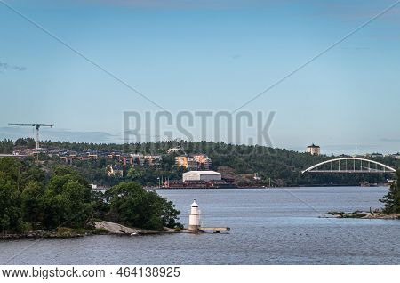 Sweden, Stockholm - July 16, 2022: Approach From Baltic Sea By Ship Passing Libertas Tiny Island Wit