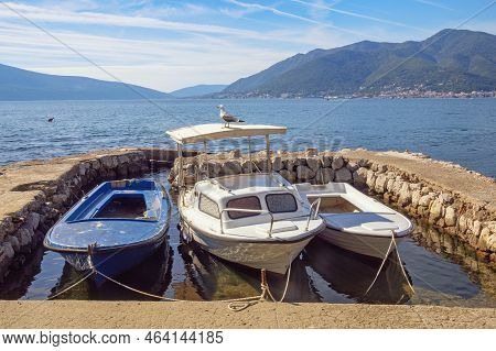 Beautiful Autumn Mediterranean Landscape. Fishing Boats At Small Stone Jetty. Montenegro, Adriatic S