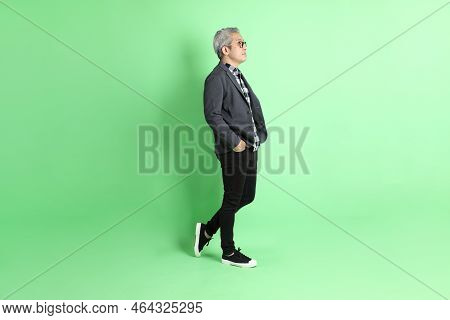 Asian Man On Green