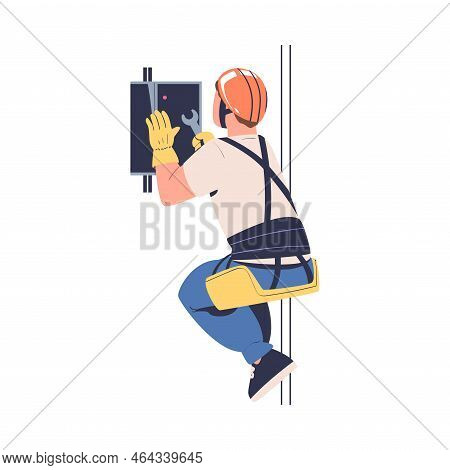 Man Working At Height With Breaker Box Suspended On Rope And Hanging With Harness Engaged In Industr