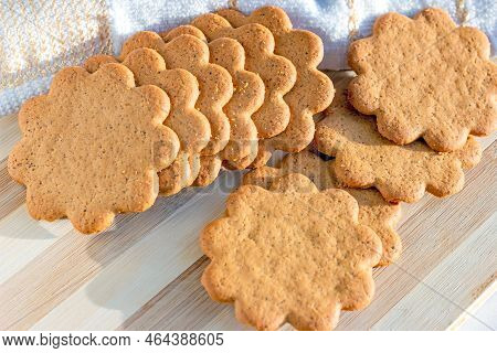 Sweet Swedish Almond Thins With Ginger And Cinnamon (pepparkaka Or Pepparkakor Biscuits) On Light Wo