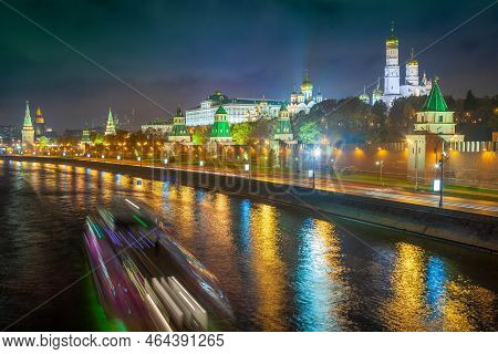 Kremlin Towers Illuminated At Evening With River Moscva Reflection, Moscow, Russia