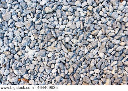Small Stone Background, Light Gravel Road Pebbles Stone Texture. Abstract Background With Farden Peb