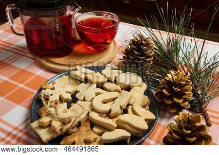 Food Still Life. Homemade Gingerbread Cookies, Teapot And Cup With Hibiscus Tea, Fir-tree Branches A