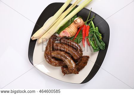 Local Northern Thai Food , Northern Thai Spicy Sausage Street Food Isolated In White Background