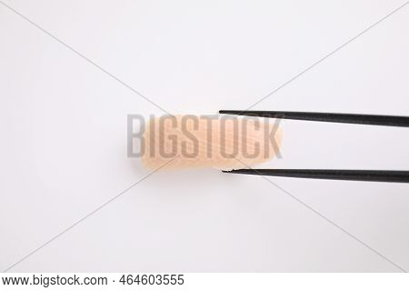 Hamachi Sushi , Japanese Food Yellowtail Sushi With Chopsticks Isolated In White Background