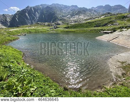 Summer Atmosphere On The Lago Dei Banchi Or Lake Banchi In The Swiss Alpine Area Of Mountain St. Got