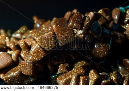 Necklace With Pebbles, Aventurine, Precious Stones, Semi-precious Stones On A Black Background