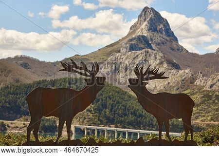 Picturesque Gilbo Mountain And Deers Landscape. Riano. Castilla Leon, Spain
