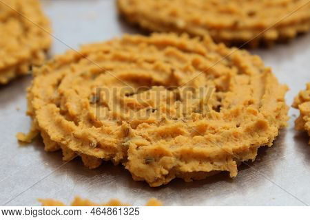 Raw Chakali In Plate. Indian Traditional Tea Time Snack Chakli, A Deep Fried Snack, It Is Known As C