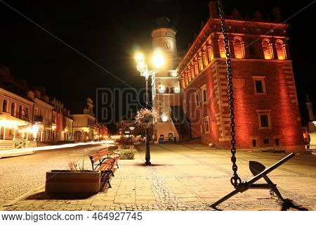 Night Photo Of The Town Hall In Sandomierz In The Old Town. Poland.
