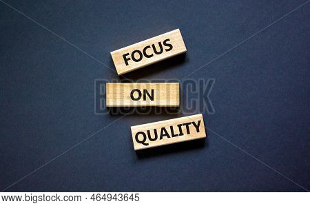 Focus On Quality Symbol. Concept Words Focus On Quality On Blocks On Beautiful Black Table Black Bac
