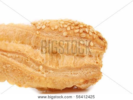 Piece of crunchy puff pastry with sesame.