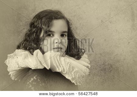 Sweet victorian girl posing in the old style with a ruff collar