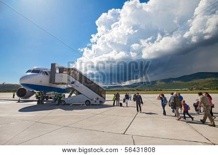 SPLIT, CROATIA - JUN 6: Croatia Airlines Airbus A319 parked on a runway of Split Airport during boarding on June 6, 2013 in Split, Croatia. Airport has very good connections to other European cities.