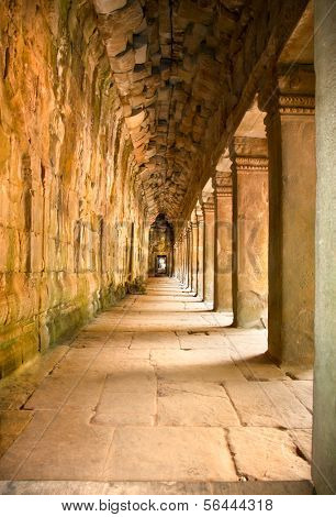 Ancient stone passage of Prasat Ta Prum or Ta Prohm Temple complex, near Siem Reap, Cambodia.