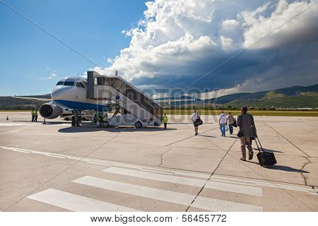 SPLIT, CROATIA - JUN 6: Croatia Airlines Airbus A319 parked on a runway of Split Airport during boarding on June 6, 2013 in Split, Croatia. Airport has very good connections to other European cities.
