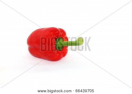 Fresh Red Sweet Peppers On A White Background